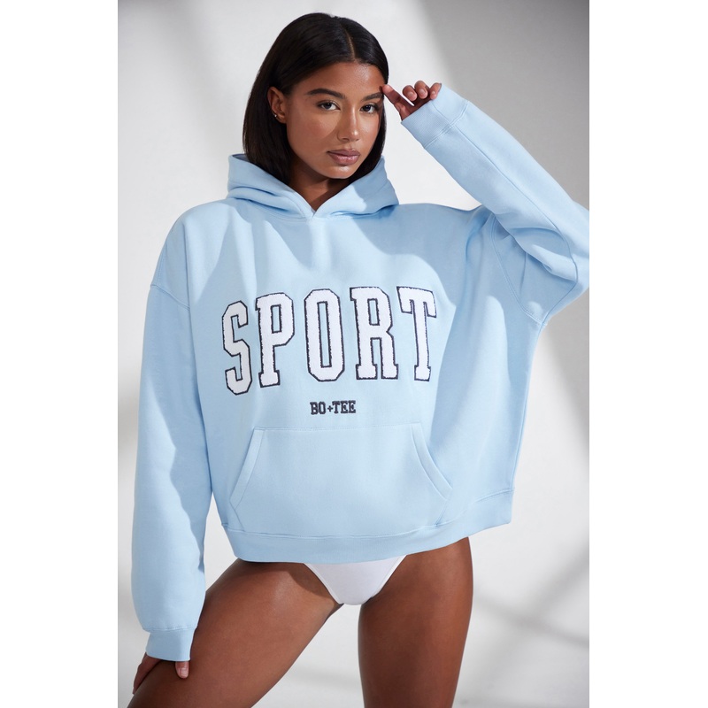 Varsity – Oversized Hooded Sweatshirt in Baby Blue